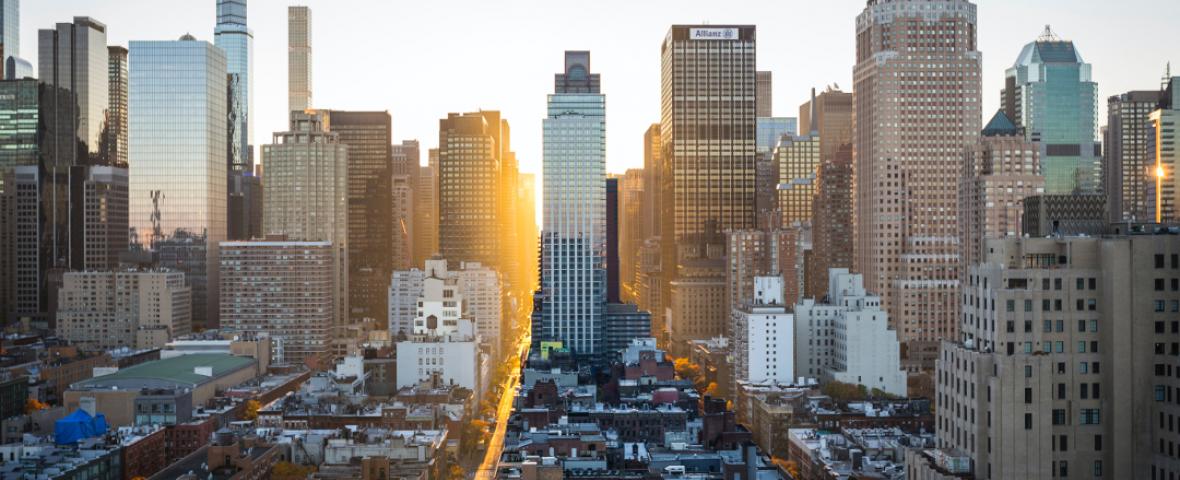 sunset over a skyscrapers and buildings